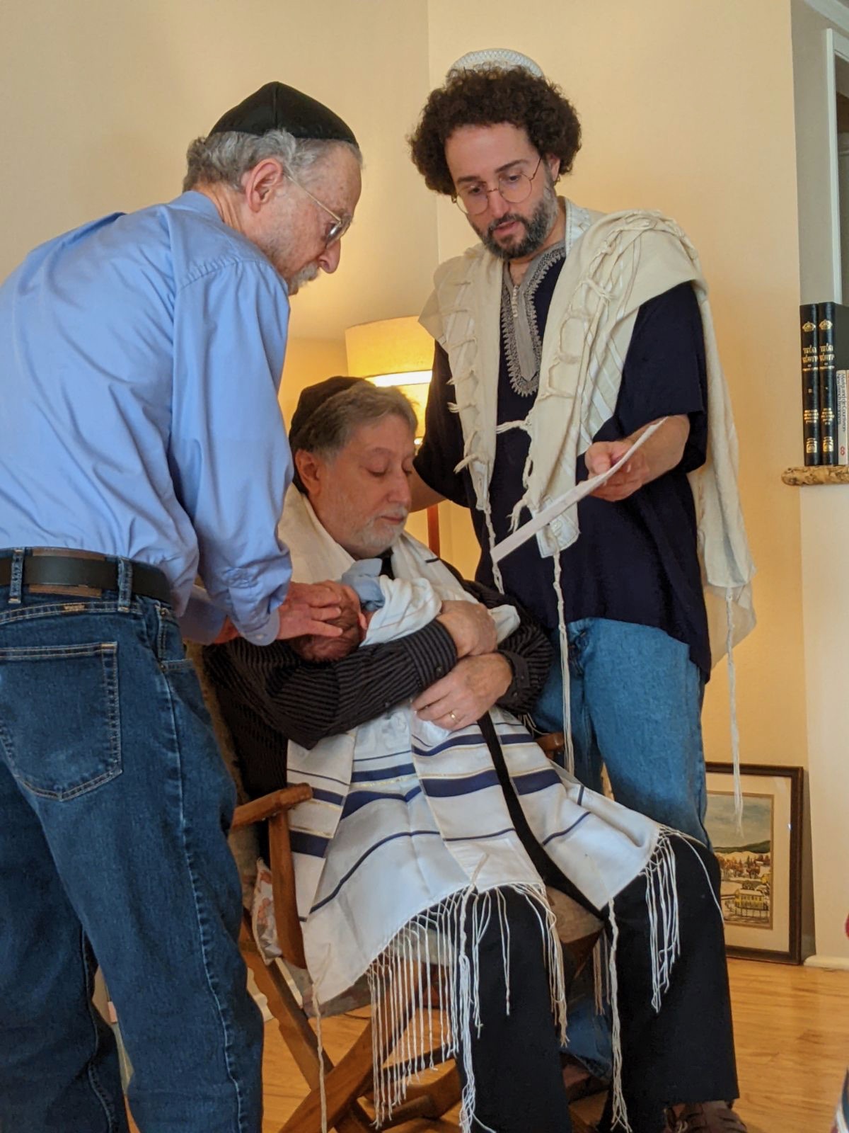 Rabbi Jason Rosner performing his son Sacha's brit milah ceremony